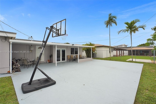 707 W 39th Pl, Hialeah, FL 33012 - rear view of property with a patio and stucco siding