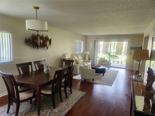 1601 SW 128th Ter Unit 201A, Pembroke Pines, FL 33027 - dining area with a textured ceiling and wood finished floors