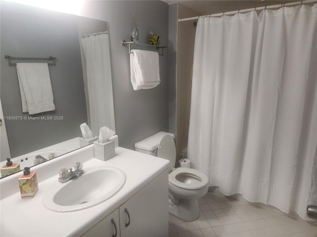 1601 SW 128th Ter Unit 201A, Pembroke Pines, FL 33027 - bathroom featuring tile patterned floors, toilet, vanity, and a shower with curtain