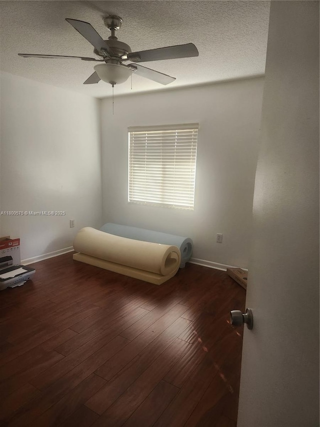 1601 SW 128th Ter Unit 201A, Pembroke Pines, FL 33027 - unfurnished bedroom with a textured ceiling, baseboards, ceiling fan, and wood finished floors