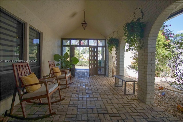 doorway to property with stucco siding
