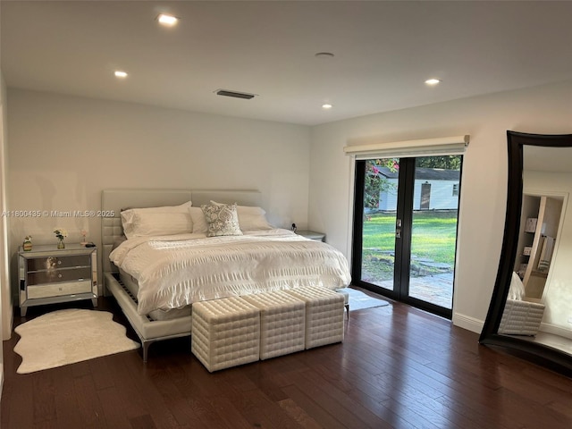 bedroom with access to exterior, wood-type flooring, recessed lighting, and baseboards