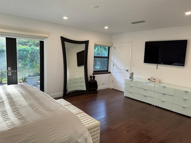 bedroom with access to exterior, dark wood-style flooring, baseboards, recessed lighting, and french doors
