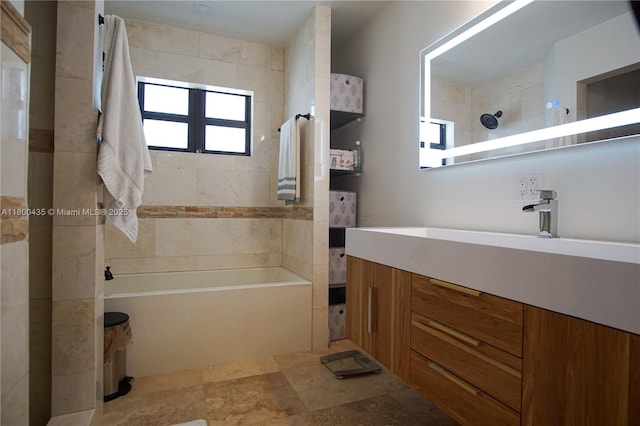 full bathroom featuring bathing tub / shower combination and vanity