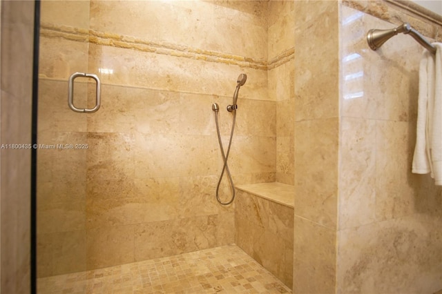 bathroom featuring a shower stall