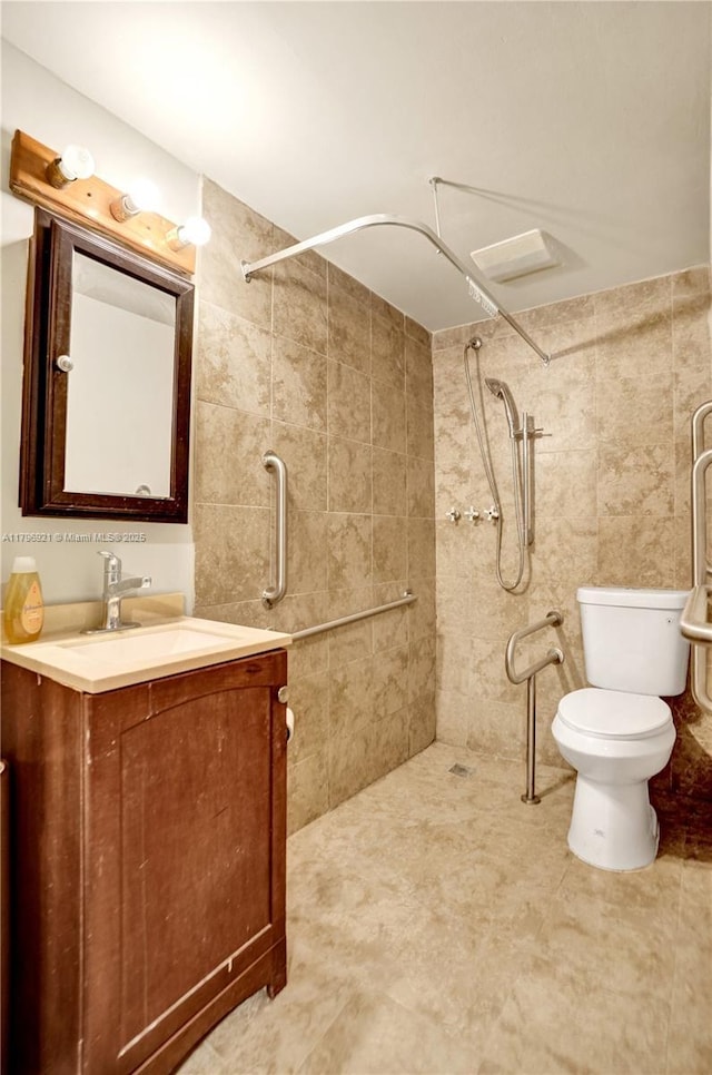 326 S 14th, Hollywood, FL 33020 - full bath featuring a tile shower, toilet, vanity, and tile walls