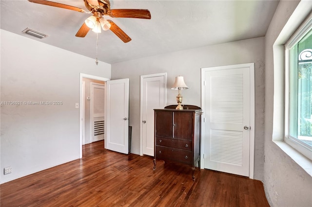 326 S 14th Ave, Hollywood, FL 33020 - unfurnished bedroom featuring wood finished floors and ceiling fan