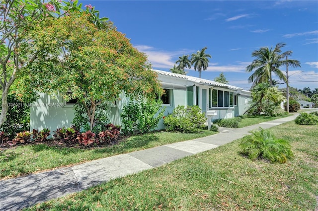 326 S 14th, Hollywood, FL 33020 - view of front facade with a front lawn and stucco siding