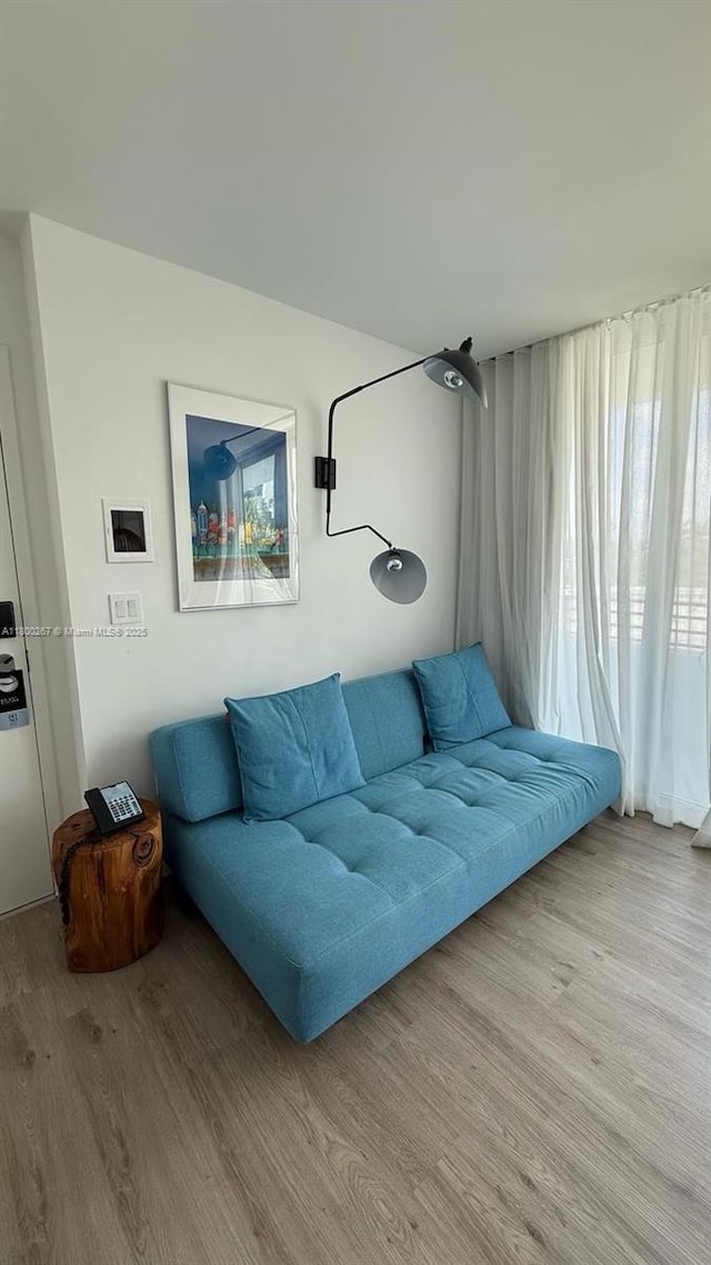 6080 Collins Ave Unit 402, Miami Beach, FL 33140 - living area featuring wood finished floors