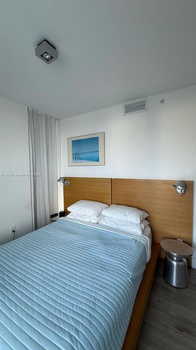 6080 Collins Ave Unit 402, Miami Beach, FL 33140 - bedroom with wood finished floors