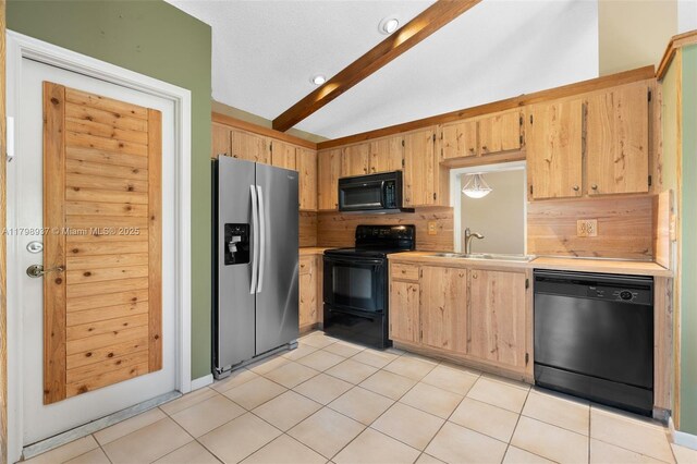 8400 NW 52nd St, Lauderhill, FL 33351 - kitchen featuring black appliances, light countertops, backsplash, a sink, and light tile patterned floors