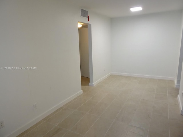 13500 NE 3rd Ct Unit 217, North Miami, FL 33161 - spare room featuring baseboards