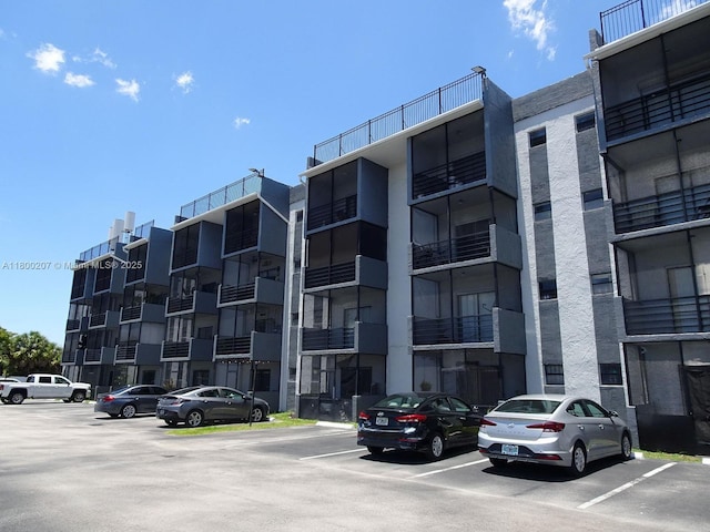 13500 NE 3rd Ct Unit 217, North Miami, FL 33161 - view of apartment building / complex featuring uncovered parking