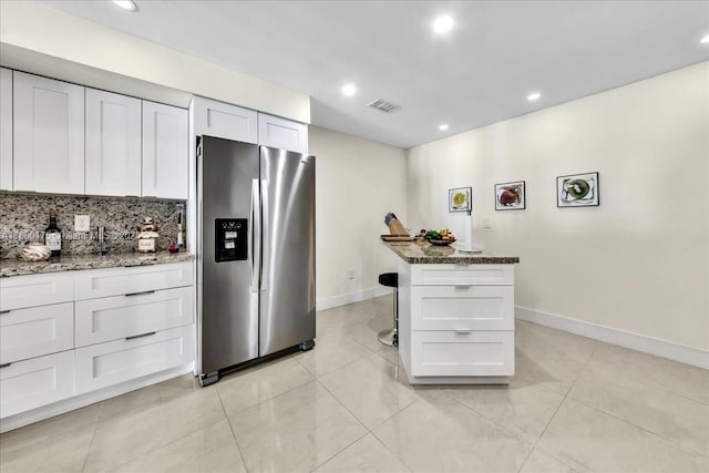 1060 SW 111th Way, Davie, FL 33324 - kitchen with stainless steel fridge, light tile patterned floors, baseboards, and recessed lighting