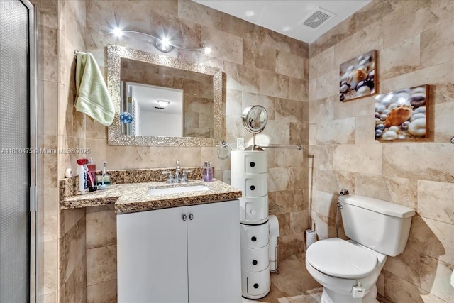 1060 SW 111th Way, Davie, FL 33324 - bathroom with tile walls, toilet, vanity, an enclosed shower, and backsplash