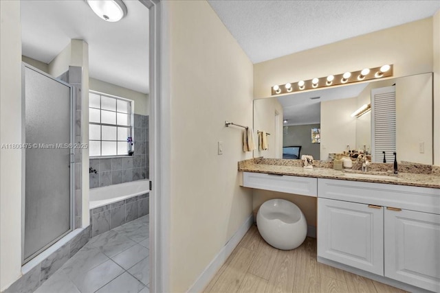 1060 SW 111th Way, Davie, FL 33324 - full bath featuring a shower stall, vanity, a bath, and baseboards