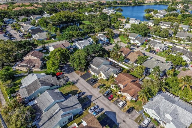 1060 SW 111th Way, Davie, FL 33324 - aerial view of property and surrounding area with nearby suburban area and a large body of water