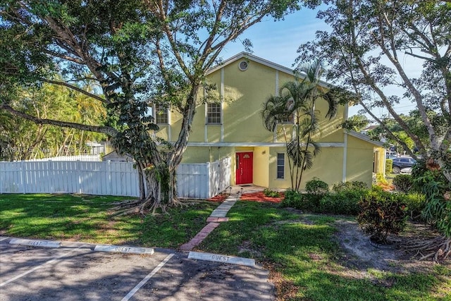 1060 SW 111th Way, Davie, FL 33324 - view of front facade with uncovered parking and stucco siding