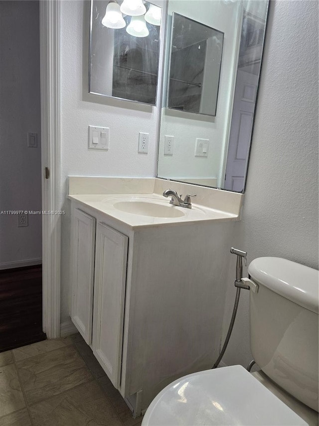 453 Dahoon Holly Dr, Daytona Beach, FL 32117 - bathroom with toilet and vanity