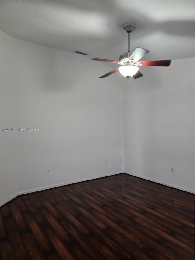 453 Dahoon Holly Dr, Daytona Beach, FL 32117 - unfurnished room featuring wood finished floors, ceiling fan, and baseboards