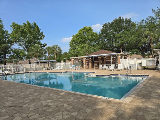 453 Dahoon Holly Dr, Daytona Beach, FL 32117 - community pool featuring fence and a patio