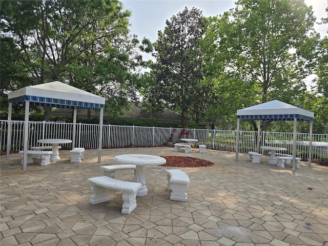 453 Dahoon Holly Dr, Daytona Beach, FL 32117 - view of patio / terrace with a gazebo and fence