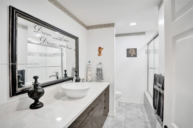 full bath featuring an enclosed shower, toilet, vanity, and baseboards