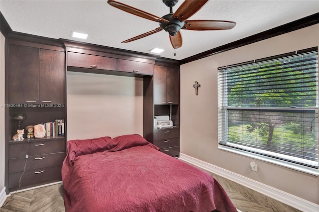 bedroom with baseboards, a textured ceiling, ornamental molding, and ceiling fan