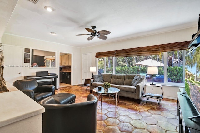 825 NE 98th St, Miami Shores, FL 33138 - living area featuring ceiling fan and recessed lighting