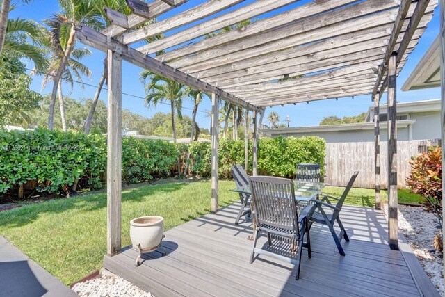 825 NE 98th St, Miami Shores, FL 33138 - wooden deck with outdoor dining area and a pergola