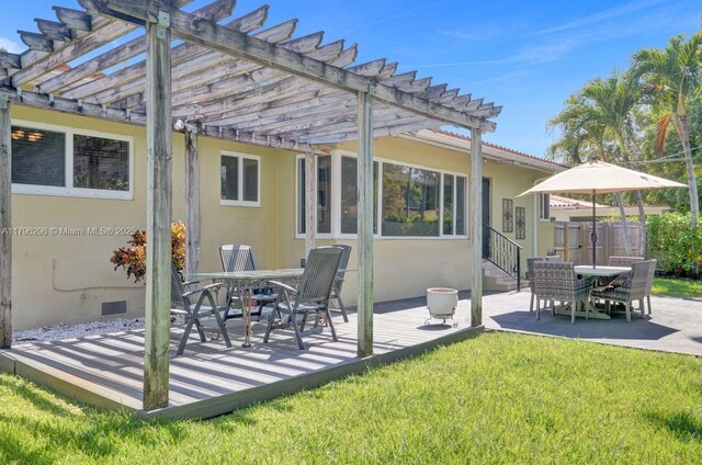 825 NE 98th St, Miami Shores, FL 33138 - view of patio featuring outdoor dining area, a pergola, and entry steps