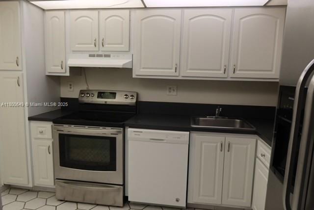3801 Environ Blvd Unit 516, Lauderhill, FL 33319 - kitchen featuring electric range, white dishwasher, fridge with ice dispenser, a sink, and extractor fan