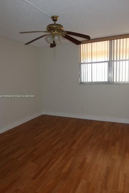3801 Environ Blvd Unit 516, Lauderhill, FL 33319 - unfurnished room featuring a ceiling fan, wood finished floors, healthy amount of natural light, and baseboards