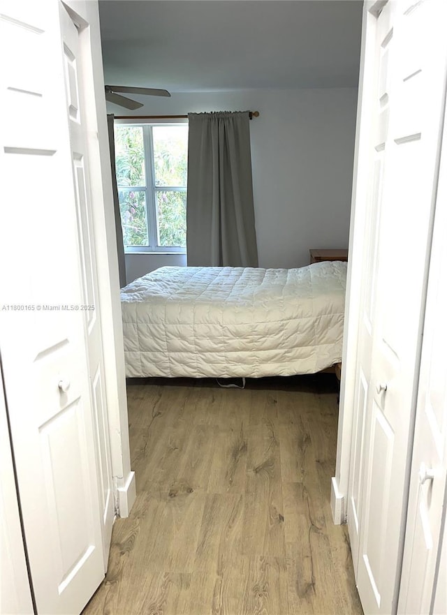 bedroom with light wood-style flooring
