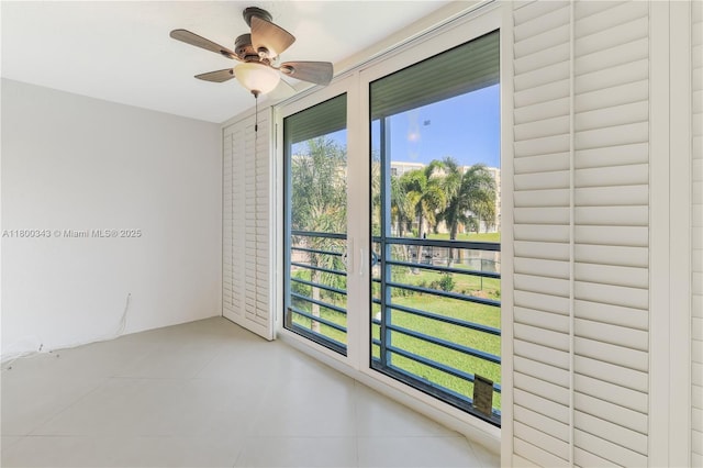 431 SE 3rd St Unit 201, Dania Beach, FL 33004 - tiled empty room featuring ceiling fan