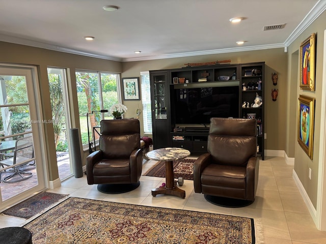 sitting room featuring light tile patterned floors, ornamental molding, and baseboards