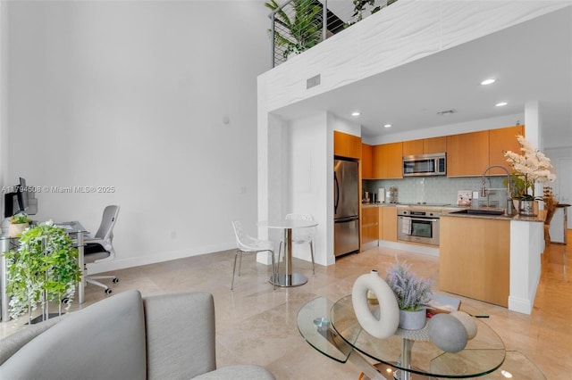 1050 Brickell Ave Unit 2416, Miami, FL 33131 - living room featuring recessed lighting and baseboards