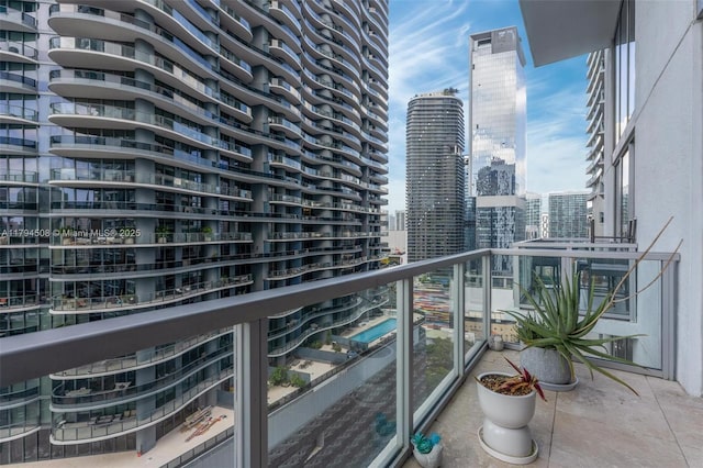 balcony featuring a city view