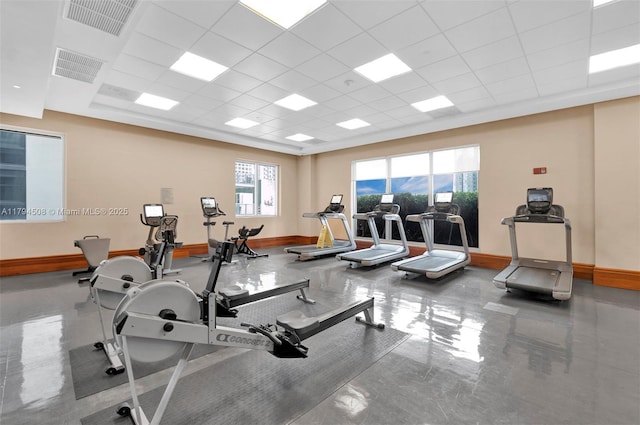 1050 Brickell Ave Unit 2416, Miami, FL 33131 - gym with baseboards and a drop ceiling