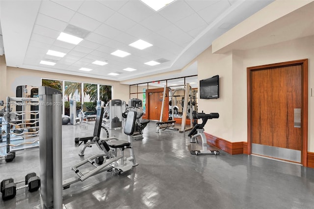 1050 Brickell Ave Unit 2416, Miami, FL 33131 - gym with a paneled ceiling and baseboards