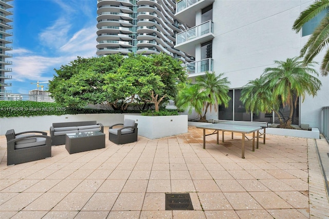 1050 Brickell Ave Unit 2416, Miami, FL 33131 - view of patio / terrace featuring an outdoor living space