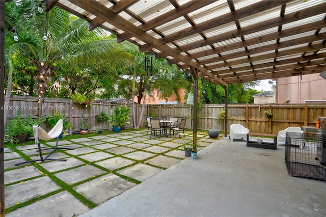377 NE 34th Ter, Homestead, FL 33033 - view of patio / terrace featuring a pergola, outdoor dining space, and a fenced backyard