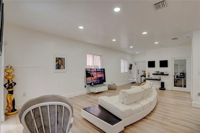 377 NE 34th Ter, Homestead, FL 33033 - living area with light wood-type flooring, recessed lighting, and baseboards