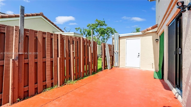 view of patio / terrace with fence