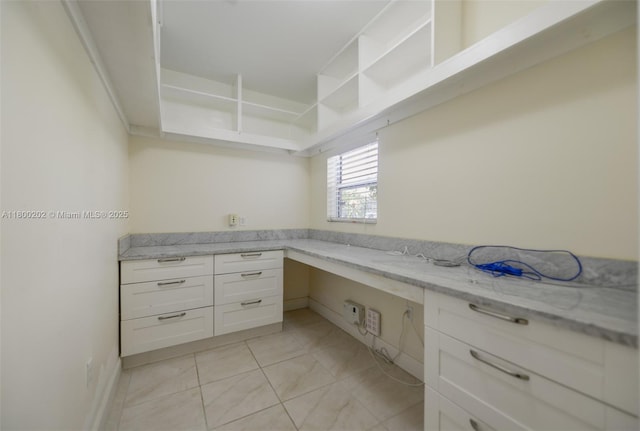 611 SW 8th St, Hallandale Beach, FL 33009 - unfurnished office with built in desk and light tile patterned flooring