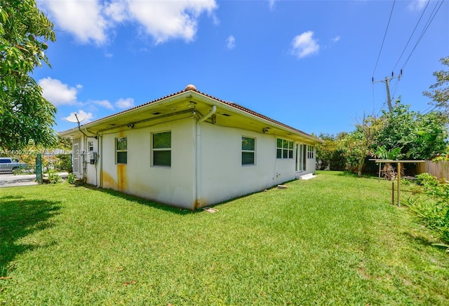 611 SW 8th St, Hallandale Beach, FL 33009 - view of property exterior featuring stucco siding and a tiled roof
