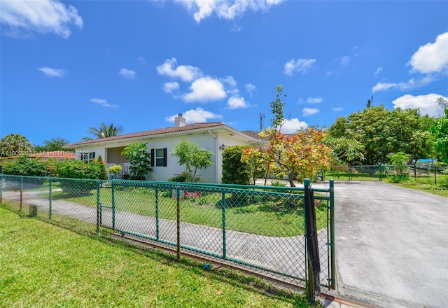 611 SW 8th St, Hallandale Beach, FL 33009 - view of side of property featuring stucco siding and a chimney