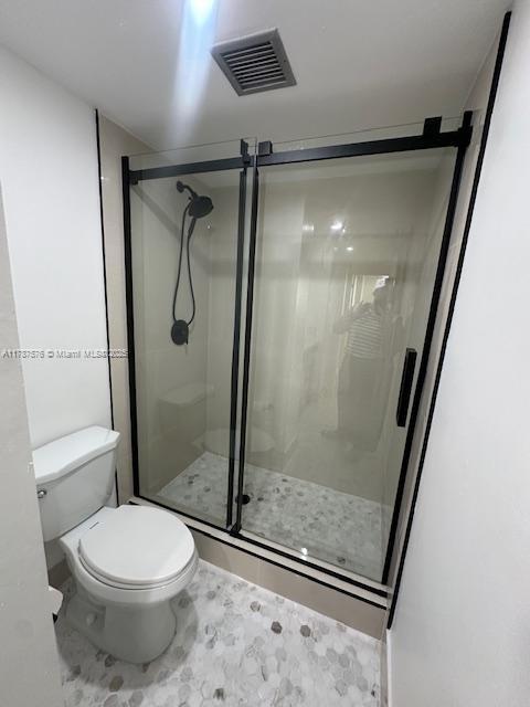 4200 Hillcrest Dr Unit 1017, Hollywood, FL 33021 - bathroom with toilet and a stall shower