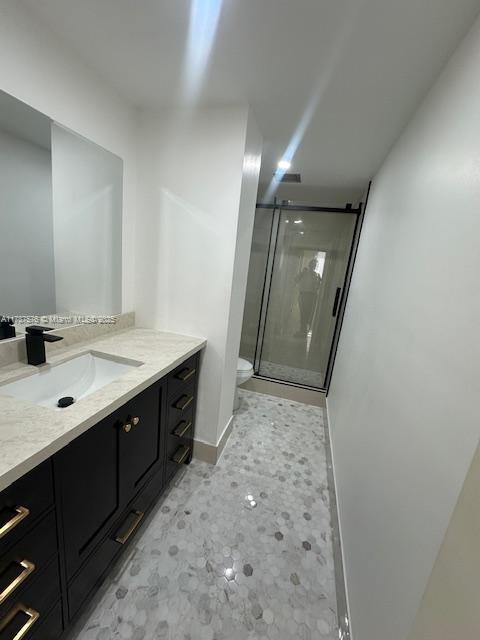 4200 Hillcrest Dr Unit 1017, Hollywood, FL 33021 - full bath with a shower stall, vanity, and toilet