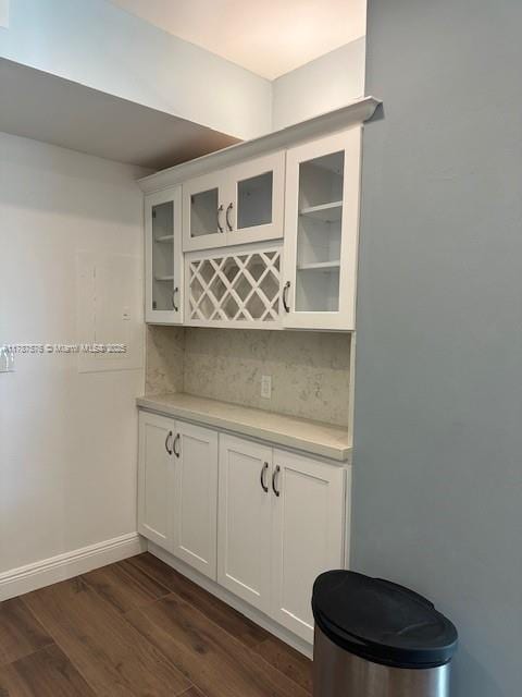 4200 Hillcrest Dr Unit 1017, Hollywood, FL 33021 - indoor dry bar with tasteful backsplash, dark wood-style flooring, and baseboards